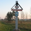 Копытный волк на гербе Логишина (памятный знак у въезда в поселок)