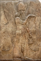 Древнеассирийский каменный рельеф, изображащий Джинна